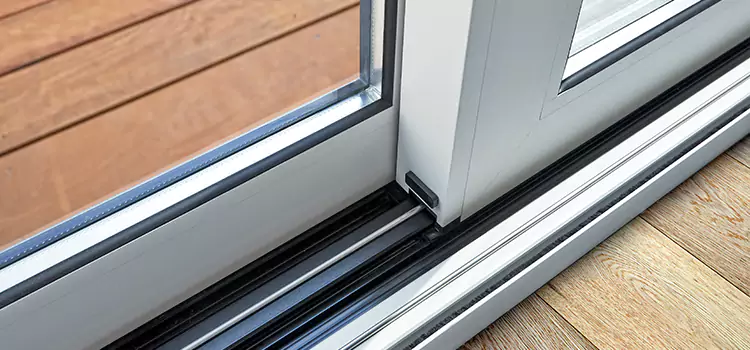 Why Your Sliding Door Keeps Getting Stuck in Coram, NY?